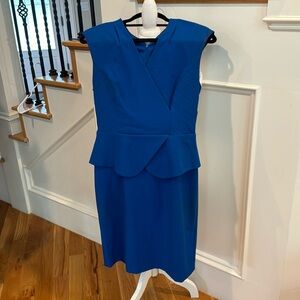 Bright blue tailored top with peplum and straight skirt by Ellen Tracy
